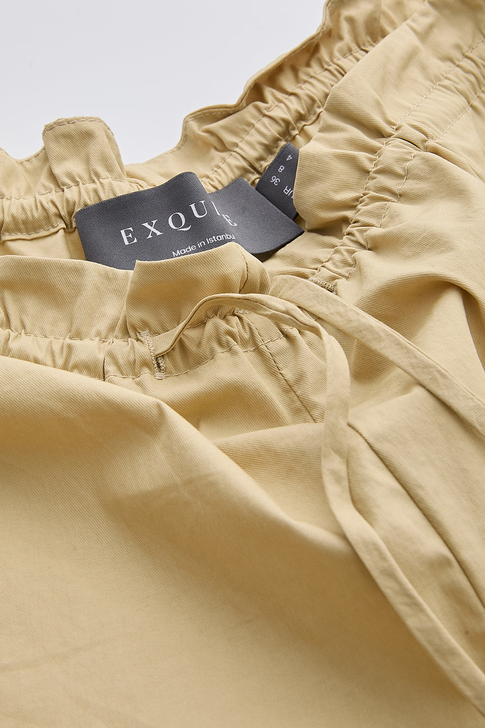 Beli Bağcıklı Cepli Dar Paça Regular Dokuma Bej Pantolon